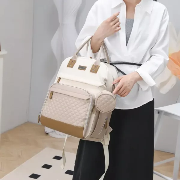 Sac à dos à langer multifonction – poches zippées et port USB intégré
