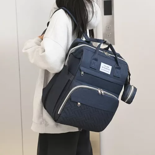 Sac à dos à langer pratique et élégant – compartiments multiples, fermeture zippée