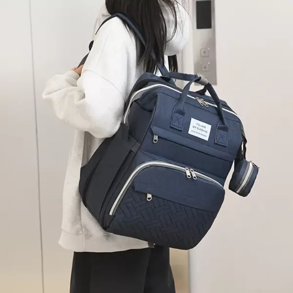Sac à dos à langer pratique et élégant – compartiments multiples, fermeture zippée